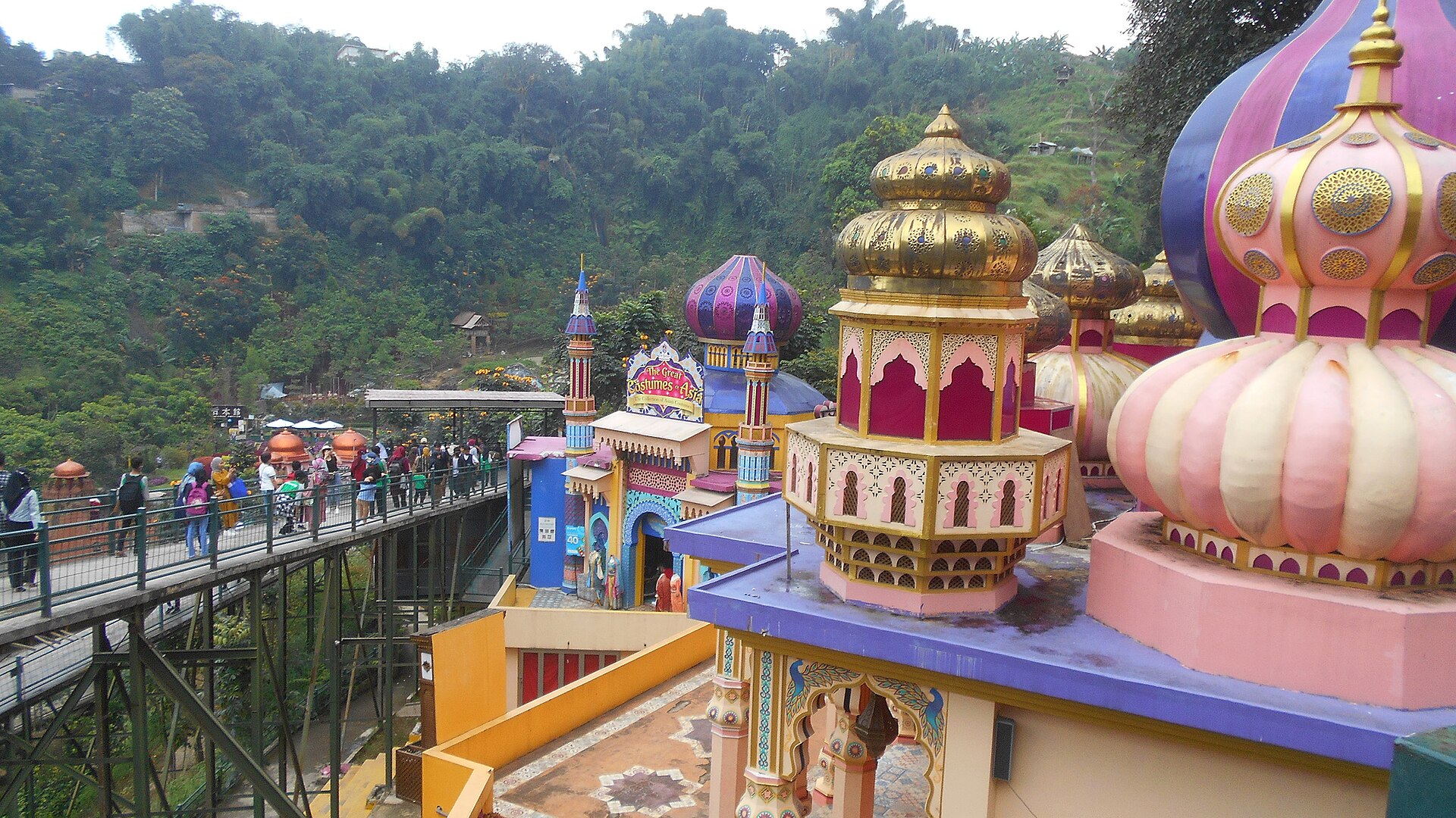 The colorful Jaipur Indian palace pavilions, costume rental salon, and walkway bridges at The Great Asia Africa Lembang