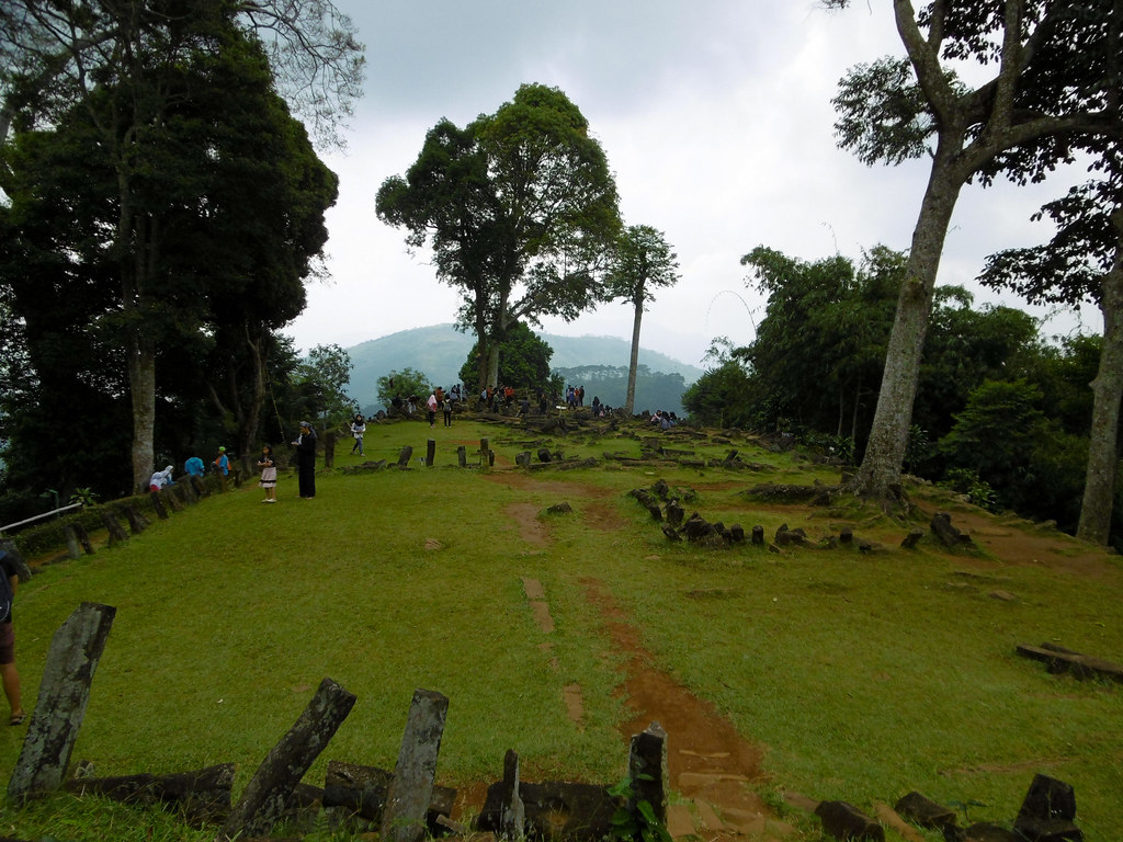 Centuries-old volcanic stone pillars arranged in terraces at Gunung Padang