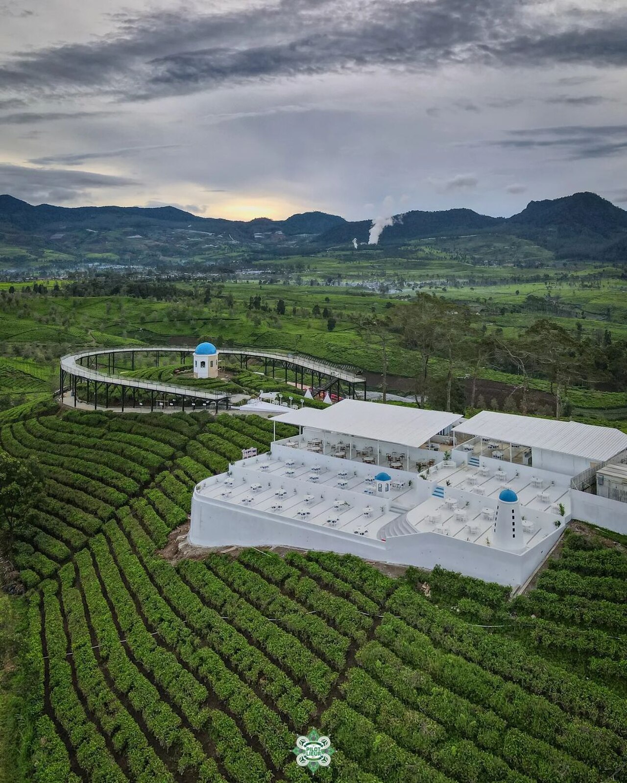 Curved panoramic observation promenade above Malabar tea hills at Nimo Highland